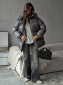 Esther | Dames Pufferjack met Koord in de Taille en Kap